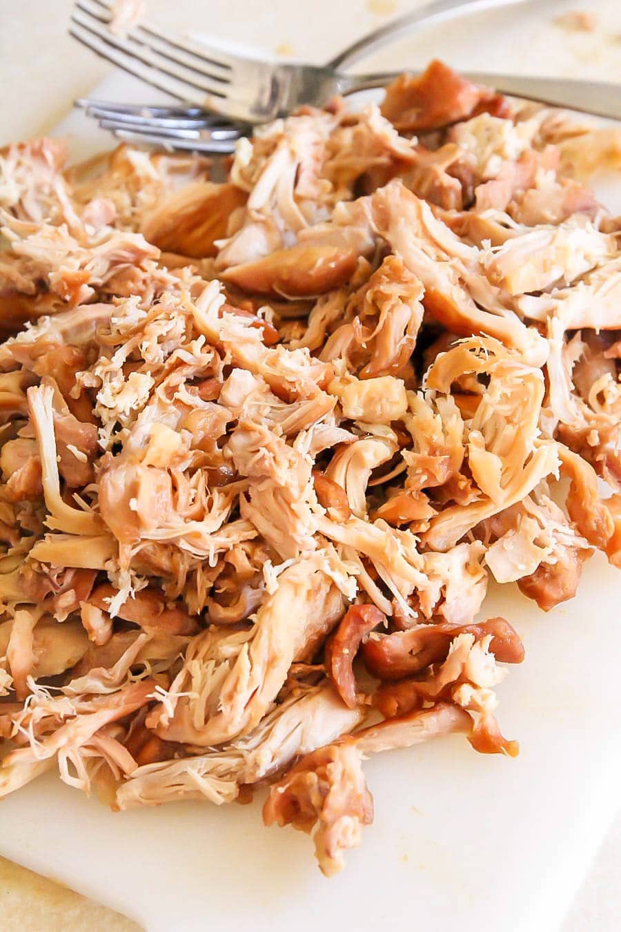 Slow cooker teriyaki chicken shredded up.
